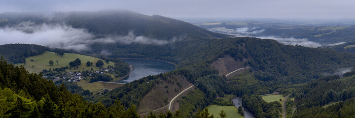 panorama landscape photo of the belgian ardennes of water management a reservoir a river and roads...