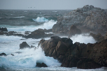 Waves crashing onto a rocky shore