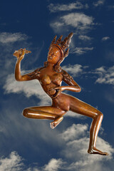 Yogini flying into clouds