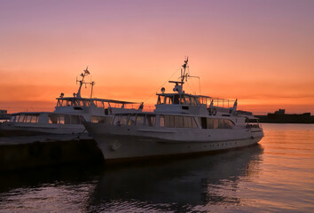 Fototapeta premium Pleasure boats at the pier in Yalta in the early morning