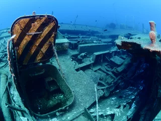 Wall murals Shipwreck  shipwreck scenery underwater ship wreck deep blue water ocean scenery of metal underwater