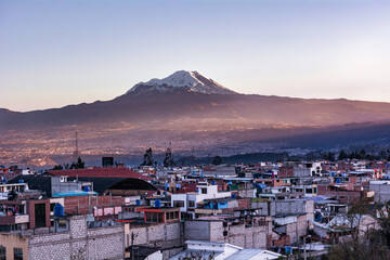Fototapeta premium Chimborazo volcano with a city