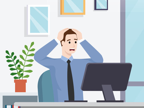 Panic and stressed man working at his office holding his head with both hands
