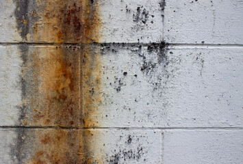 Abstract background stone wall rust stains and aged