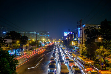 Traffic jam moves slowly along a busy road in city center in Bangkok. Annually an estimated 150,000...