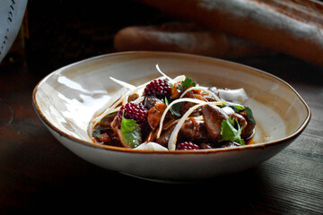Fried chicken hearts with fennel and pickled blackberries