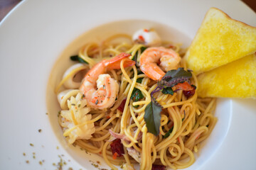 Close up spaghetti on white plate in resterant.
