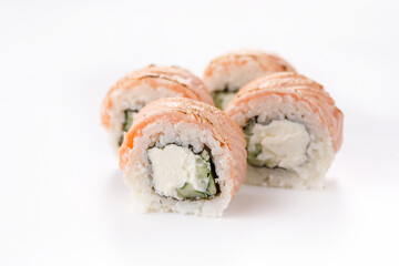 Baked Philadelphia sushi rolls on a white background. Isolated. Restaurant concept. Close-up.