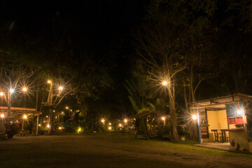 Obraz premium Beautiful night light sparkle in camping resort Thailand