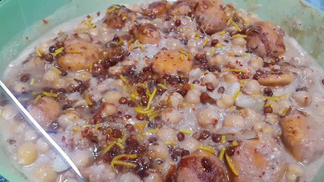 Closeup view of fresh tasty and spicy homemade channa chaat dish.