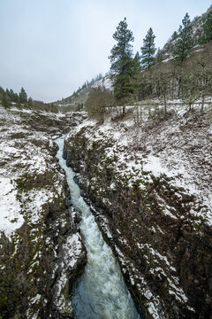 Swale Canyon along the Klickitat River surrounded by snow during the winter season. Lewis and clark called it Cataract River due to the rapids on this wild and scenic river. A Columbia tributary. 