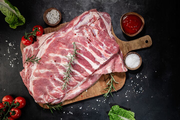 Raw fesh spare ribs isolated on wooden board