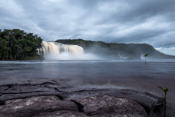 Long night photo exhibition of the El Hacha waterfall, located in the Canaima lagoon in Venezuela