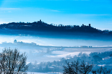 Obraz na płótnie Canvas castles in the snow and fog