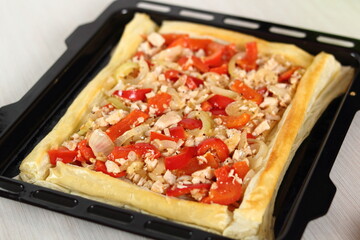 Filling in pastry case. Making Chicken and Egg Galette Series.