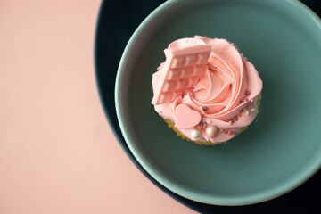 Geometric Composition with Cake on Round Blue Plates with Pink Photon