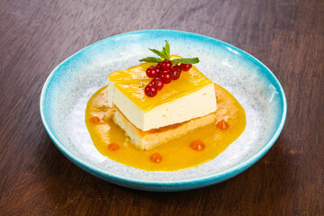 Traditional Cheesecake with orange sauce