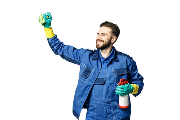 Young handsome man with a beard in the uniform of a cleaner smiles while holding a rag and chemical spray bottle. Wipe invisible glass on a white background