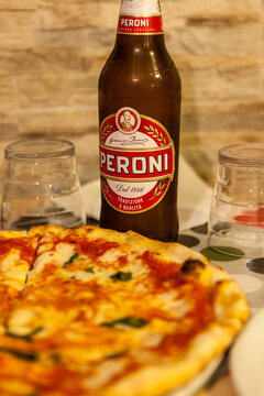 Margherita pizza and Peroni