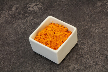 Tumeric powder in the bowl