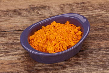 Tumeric powder in the bowl