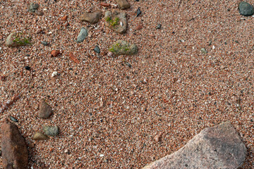 Red Sand and Stones of the red Sea Coast, Natural Texture Background