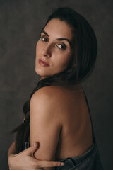 Stylish portrait of a girl. Atmospheric portrait of a wise girl. The girl thought about life