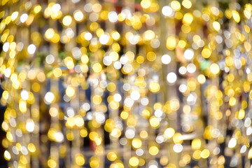 Blurred bokeh light gold background.