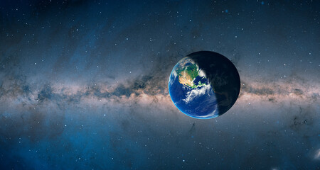 Planet Earth in front of the Milky Way galaxy "Elements of this image furnished by NASA "