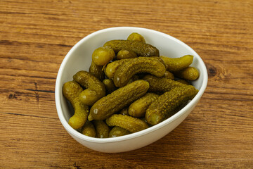 Pickled gherkin in the bowl