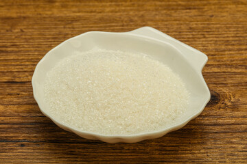 White sugar in the bowl
