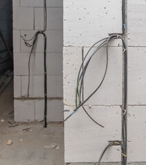 Wire in the wall preparation before plastering.