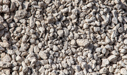 Stone gravel at a construction site as a background.