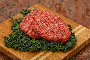 Raw beef burger cutlet for cooking