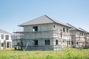 construction residential new house from prefabrication system in progress at building site