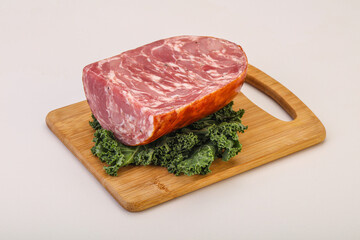 Beef ham piece over board