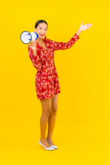 Portrait beautiful young asian woman with megaphone for communication