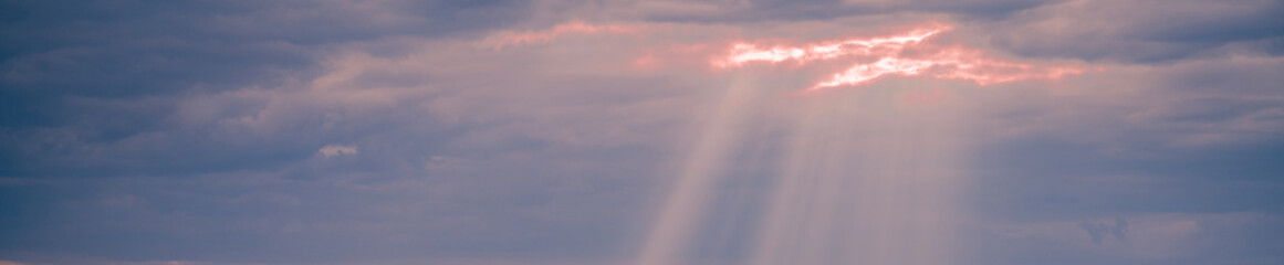 Dramatic sunset in the countryside. Panoramic shot. High resolution sharp photo. Panorama banner.