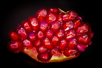 pomegranate on black background
