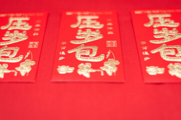 Chinese New Year Red Packets on Red Background