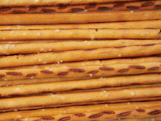 Salty crackers on a white background, cookie snacks. Selective focus.