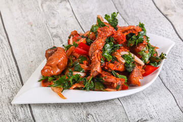 Marinated chicken breast slices with cilantro