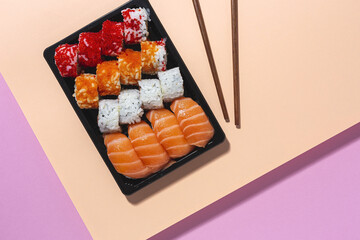 Japanese food concept to go. Sushi take away assortment
