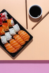 Japanese food concept to go. Sushi take away assortment