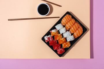 Japanese food concept to go. Sushi take away assortment