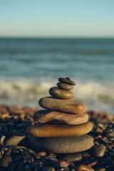 pyramid of stones with sea view