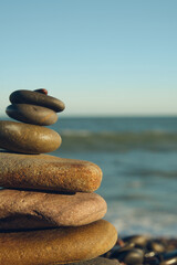 pyramid of stones with sea view