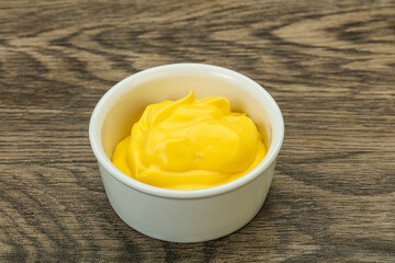 Natural cheese sauce in the bowl