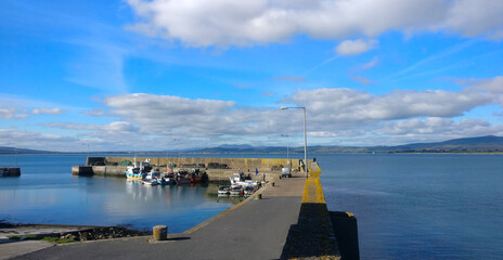 Sunshine and blue sky at Ring Harbour in Ireland