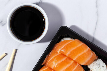 Japanese food concept to go. Sushi take away assortment